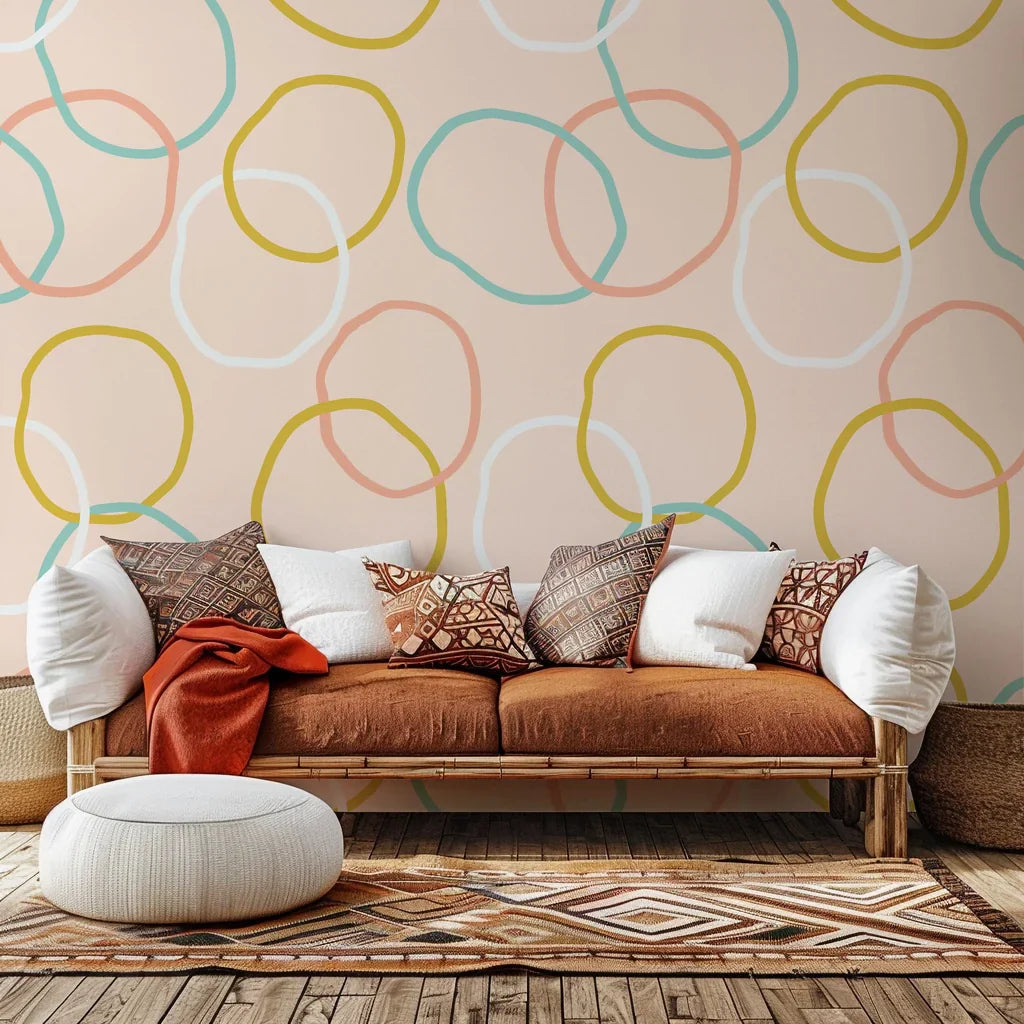 Self-adhesive wallpaper featuring the Loop Dreams design in soft pink and yellow abstract loops