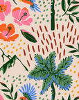Peach-toned wall covering from Lush Notion, adorned with tropical birds, palm foliage, and large hibiscus blooms