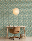 Magnolia Morning green botanical peel and stick wallpaper as a feature wall in a bright home office