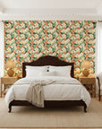 Marigold Orchard warm orange botanical wallpaper adding character to a cozy bedroom