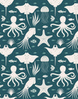 A self-adhesive wall covering with a nautical sea life pattern in white and teal blue, known as Marine Dream