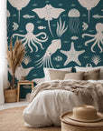 Teal and white peel-and-stick wallpaper featuring nautical sea life designs
