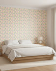Matisse Meadow playful pastel floral wallpaper adding character to a cozy bedroom