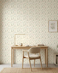 Meadow Song serene botanical wildflower wallpaper as a feature wall in a bright home office