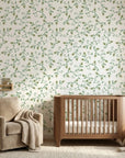 Meadow Wander green floral peel and stick wallpaper bringing warmth to a peaceful nursery