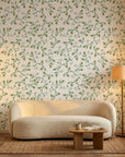 Meadow Wander green floral peel and stick wallpaper in a warm and inviting living room
