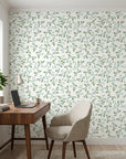 Meadow Wander green floral peel and stick wallpaper as a feature wall in a bright home office
