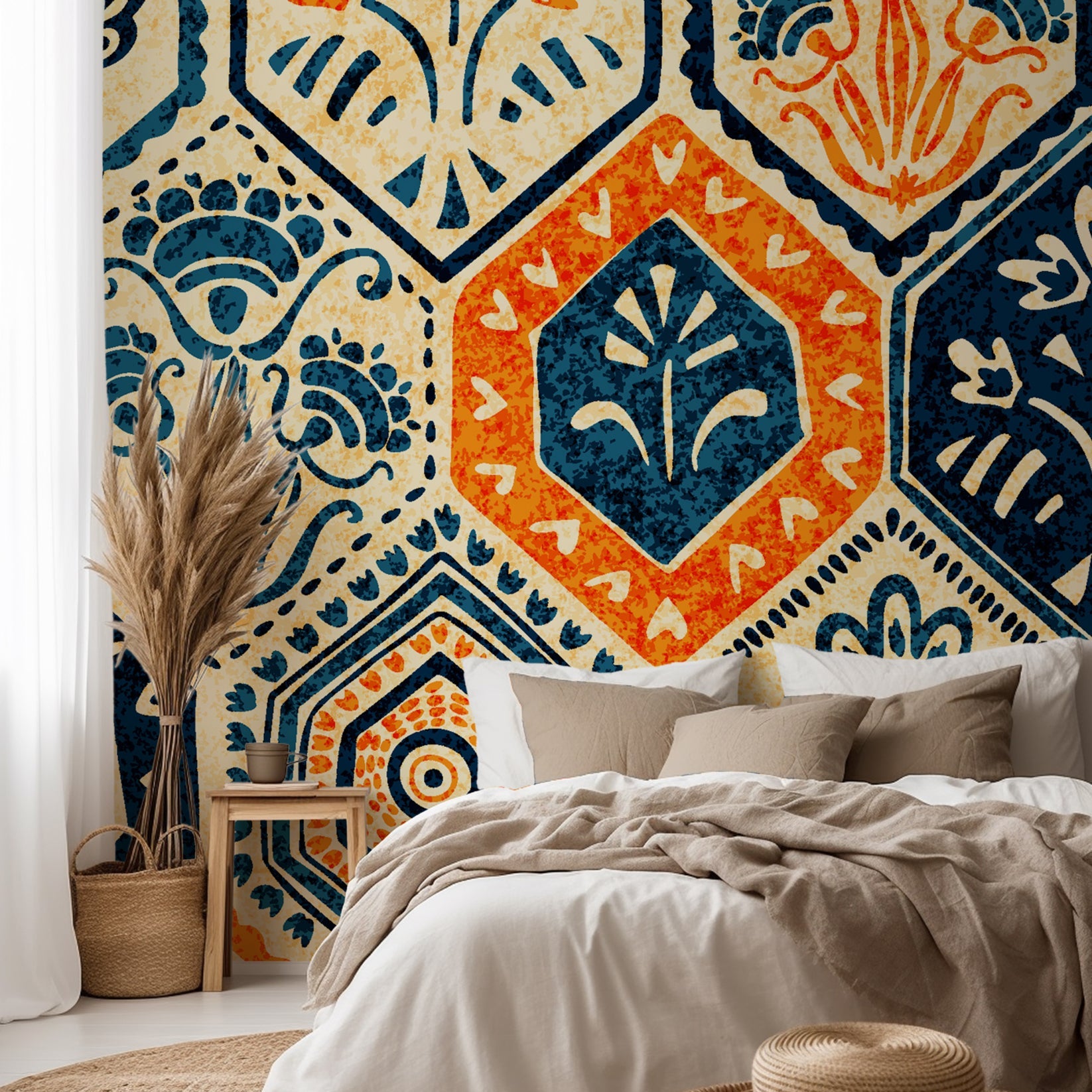 Vintage hexagon tile wallpaper with hand printed floral motifs in navy blue, warm orange, and cream tones.
