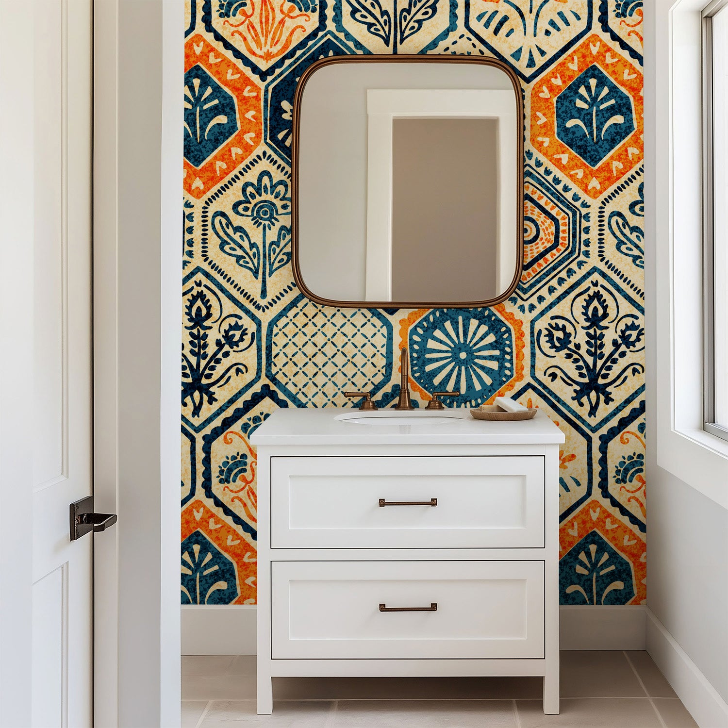 Vintage hexagon tile wallpaper with hand printed floral motifs in navy blue, warm orange, and cream tones.