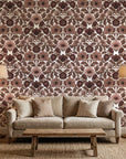 Merlot Garden rich burgundy floral damask wallpaper in a warm and inviting living room