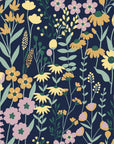 Modern Midnight Bouquet wallpaper featuring yellow daisies and pink blooms on navy peel and stick background
