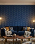 Midnight Crossing bold navy and gold geometric wallpaper creating ambiance in a serene bathroom
