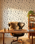 Midnight Dust white with black star pattern wallpaper as a feature wall in a bright home office