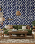 Midnight Embroidery elegant navy floral wallpaper in a warm and inviting living room
