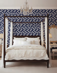 Midnight Embroidery elegant navy floral wallpaper adding character to a cozy bedroom