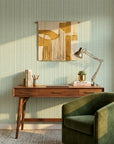 Mint Morse sage green geometric stripe wallpaper as a feature wall in a bright home office