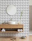 Mist & Stone grey geometric peel and stick wallpaper creating ambiance in a serene bathroom