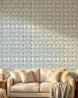 Misted Grid grey & blue abstract wallpaper in a warm and inviting living room
