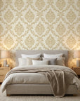 Misty Fern Romance soft gold damask wallpaper adding character to a cozy bedroom