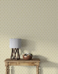 Gold and cream damask Misty Fern Romance wallpaper in traditional living room with wood console table