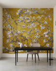 Golden and lavender Monet's Garden peel and stick wallpaper featuring cherry blossom branches in minimalist office