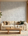 Morning Frost grey abstract weave wallpaper in a warm and inviting living room