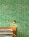 Moss Field green organic texture wallpaper adding character to a cozy bedroom