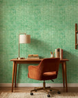 Moss Field green organic texture wallpaper as a feature wall in a bright home office