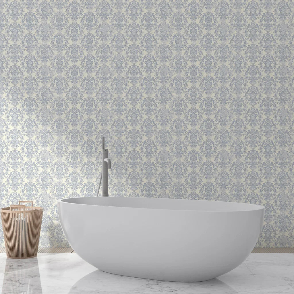 Blue and cream damask Moss Rose Mosaic wallpaper in elegant bathroom with freestanding tub