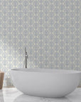 Blue and cream damask Moss Rose Mosaic wallpaper in elegant bathroom with freestanding tub