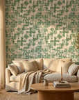 Mossy Ground green abstract peel and stick wallpaper in a warm and inviting living room