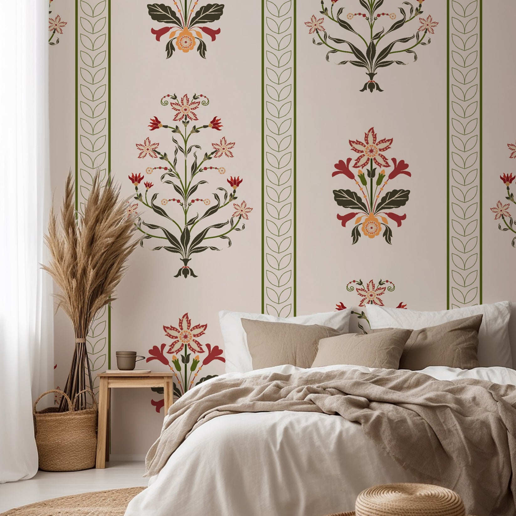 Vertical floral stripe wallpaper with symmetrical folk inspired flowers in red, olive green, and soft peach on a warm cream background.