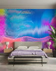 Neon Tide vibrant blue and pink abstract wallpaper in a warm and inviting living room