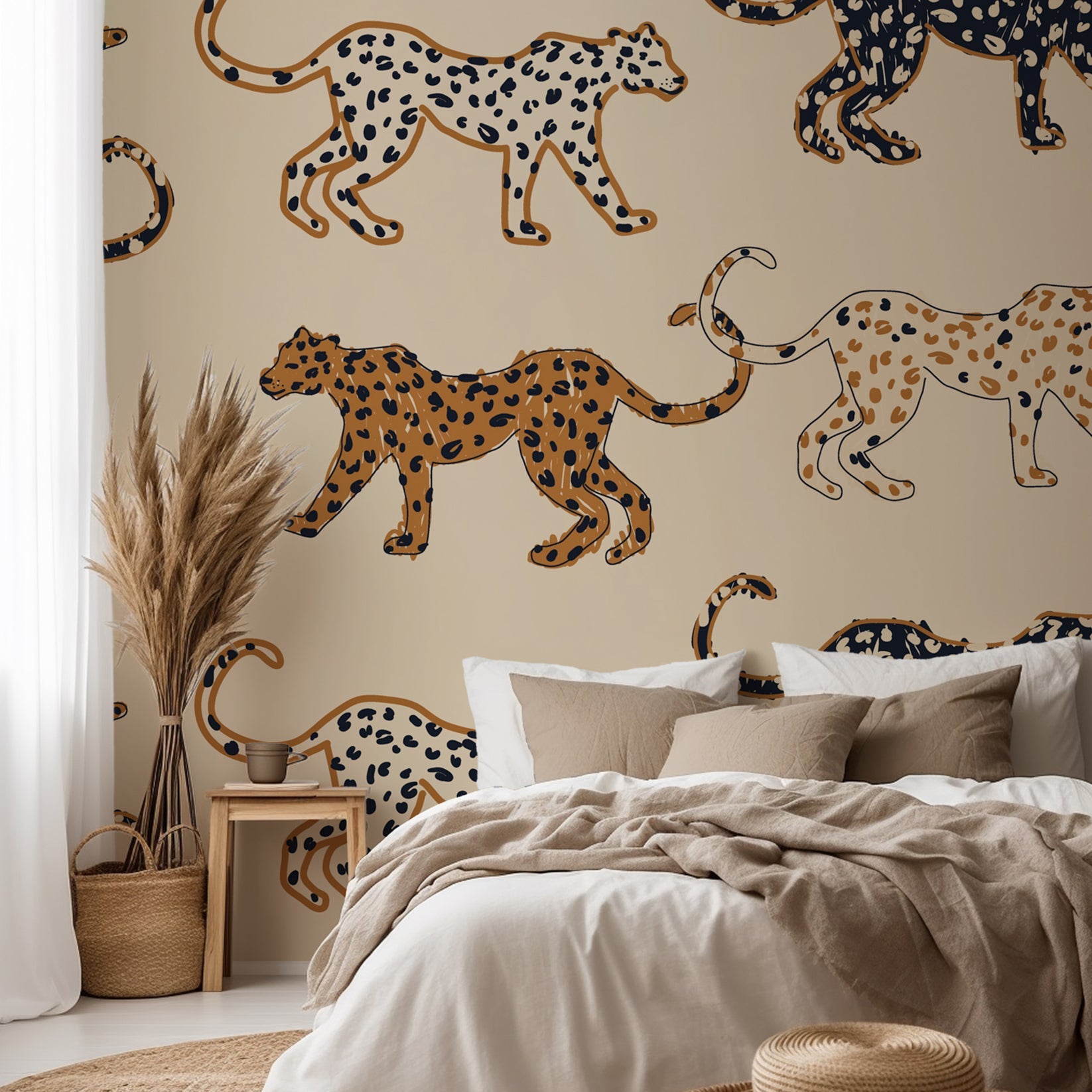 Playful leopard wallpaper with hand illustrated spotted cats in tan, caramel, and black on a soft beige background.
