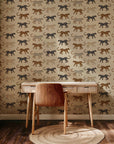 Playful leopard wallpaper with hand illustrated spotted cats in tan, caramel, and black on a soft beige background.