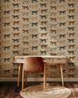 Hand-illustrated wallpaper showing playful tan, caramel, and black spotted cats. The entire design is layered over a light, soft beige surface.