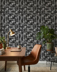 Obsidian Quarry grey abstract peel and stick wallpaper as a feature wall in a bright home office