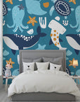 Marine-themed adhesive wallpaper featuring majestic teal whales and octopuses across a blue aquatic backdrop. - Ocean Dreams