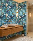 Ocean Dreams teal blue whale and octopus wallpaper adding character to a cozy bedroom