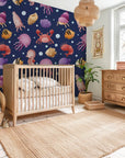 Whimsical watercolor sea creatures against a dark midnight blue backdrop easy-apply wallpaper - Ocean Bloom