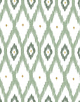 Soft sage green ikat wallpaper with hand painted diamond shapes and subtle gold accents on a white background.