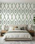 Ogee Loom blue ikat wallpaper adding character to a cozy bedroom