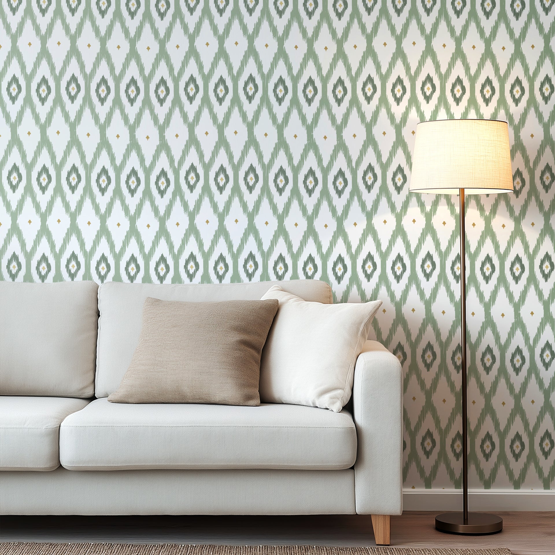 Soft sage green ikat wallpaper with hand painted diamond shapes and subtle gold accents on a white background.