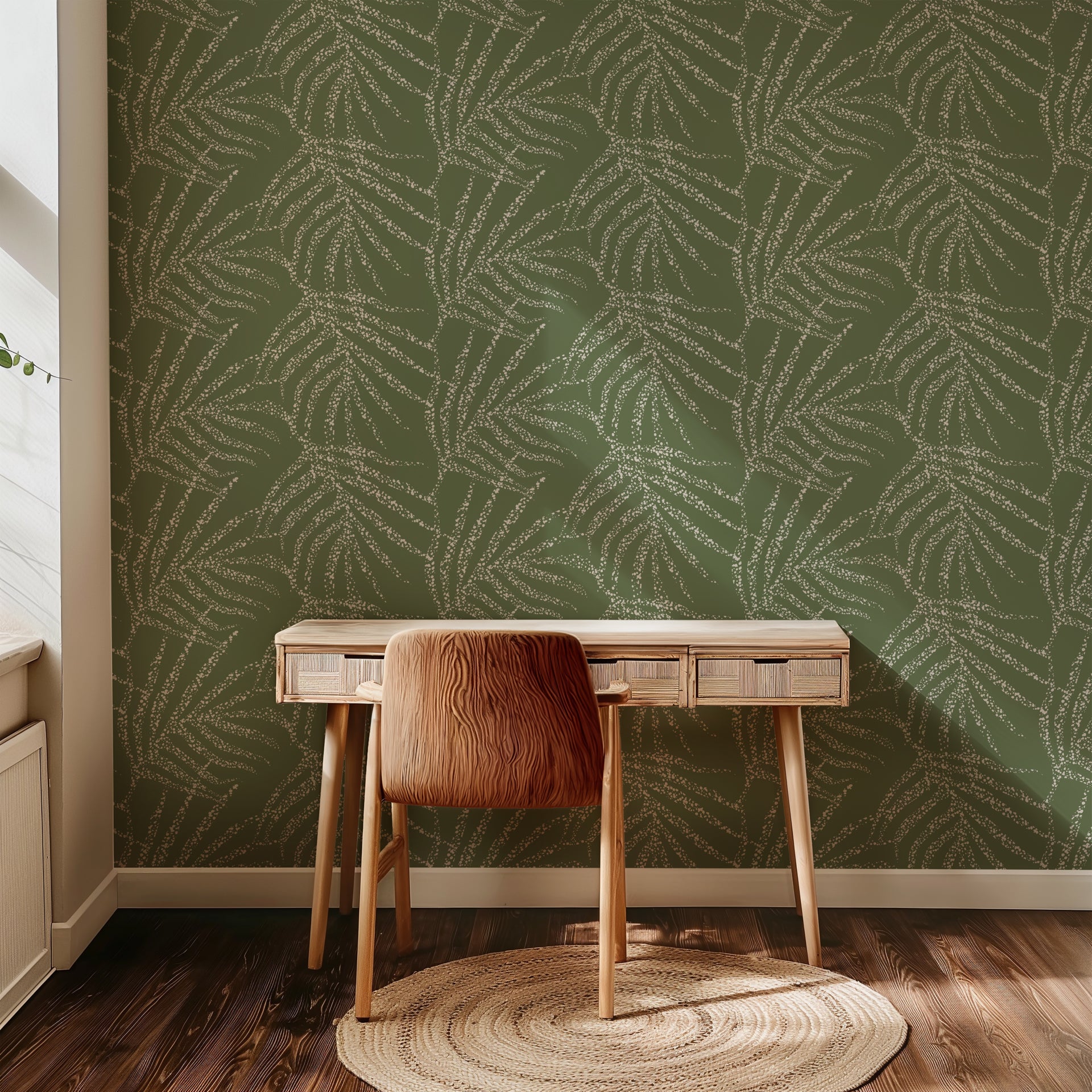 Olive green abstract wallpaper with scattered white speckled brush strokes forming an energetic, organic pattern.