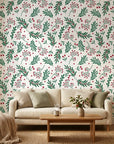 Olive & Berry festive botanical wallpaper in a warm and inviting living room