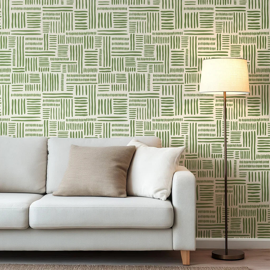 Abstract design showing manually drawn brush stroke sections in olive green that create a loose grid structure on a warm, off-white background.