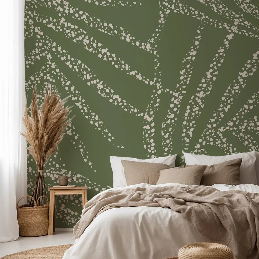 Abstract olive green wall covering textured with scattered, speckled white brushwork
