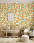 Orchard Zest retro floral peel and stick wallpaper as a feature wall in a bright home office