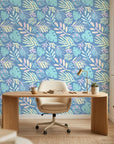 Painted Breeze pastel palm wallpaper as a feature wall in a bright home office