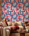 Painted Horizon abstract blue and pink wallpaper in a warm and inviting living room